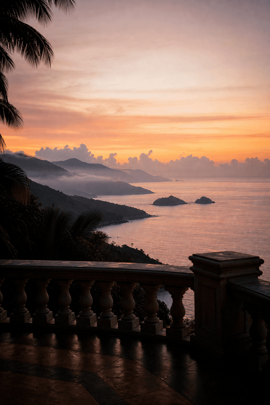 Dawn mist over a tropical bay, seen from a villa terrace